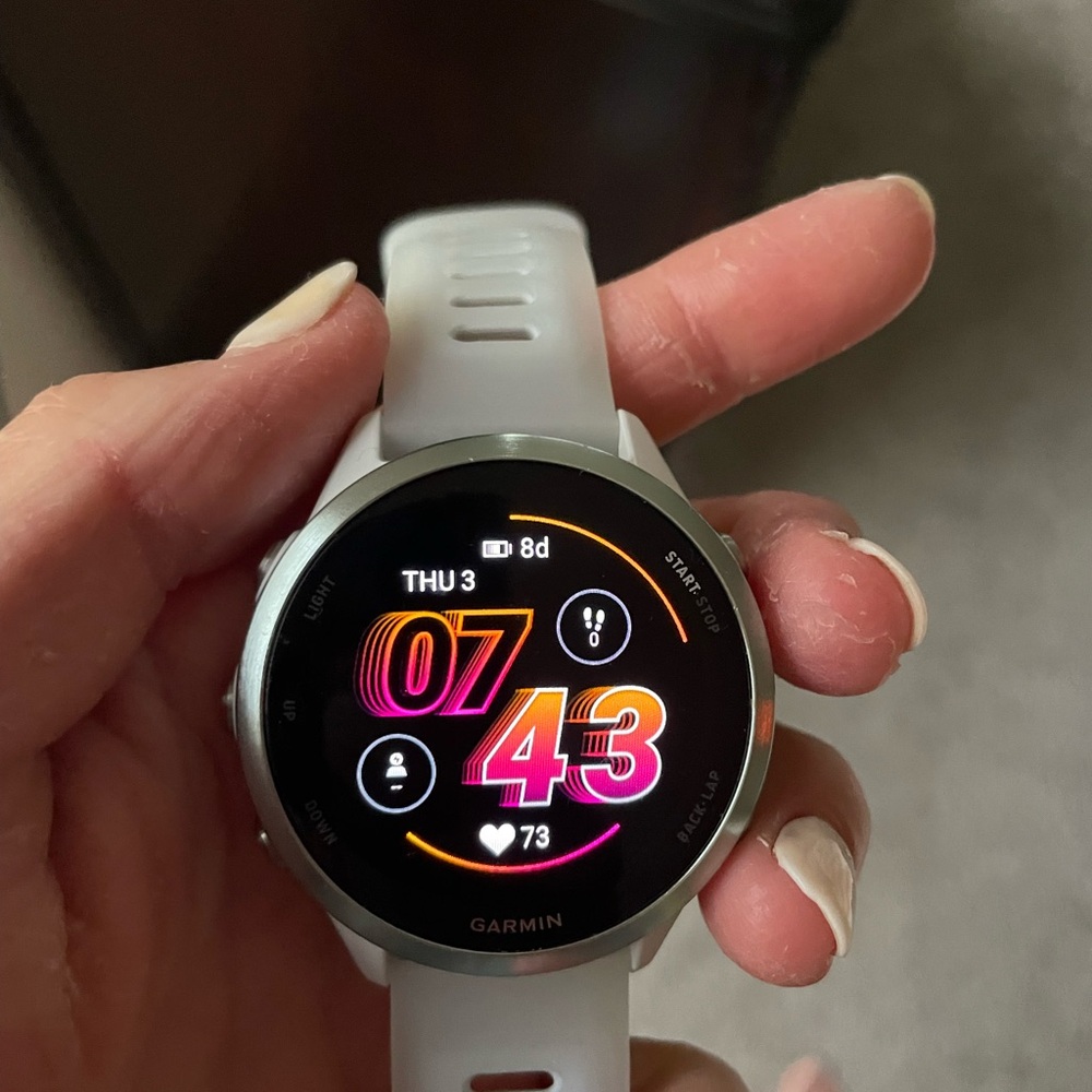 Garmin forerunner 570 White Smartwatch with Circular Display and Modern Design